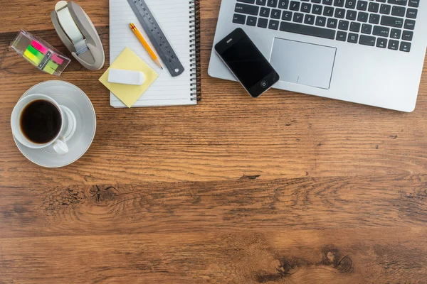 Laptop, Mobile Phone and coffee cup on work desk, Creativity — Stock Photo, Image