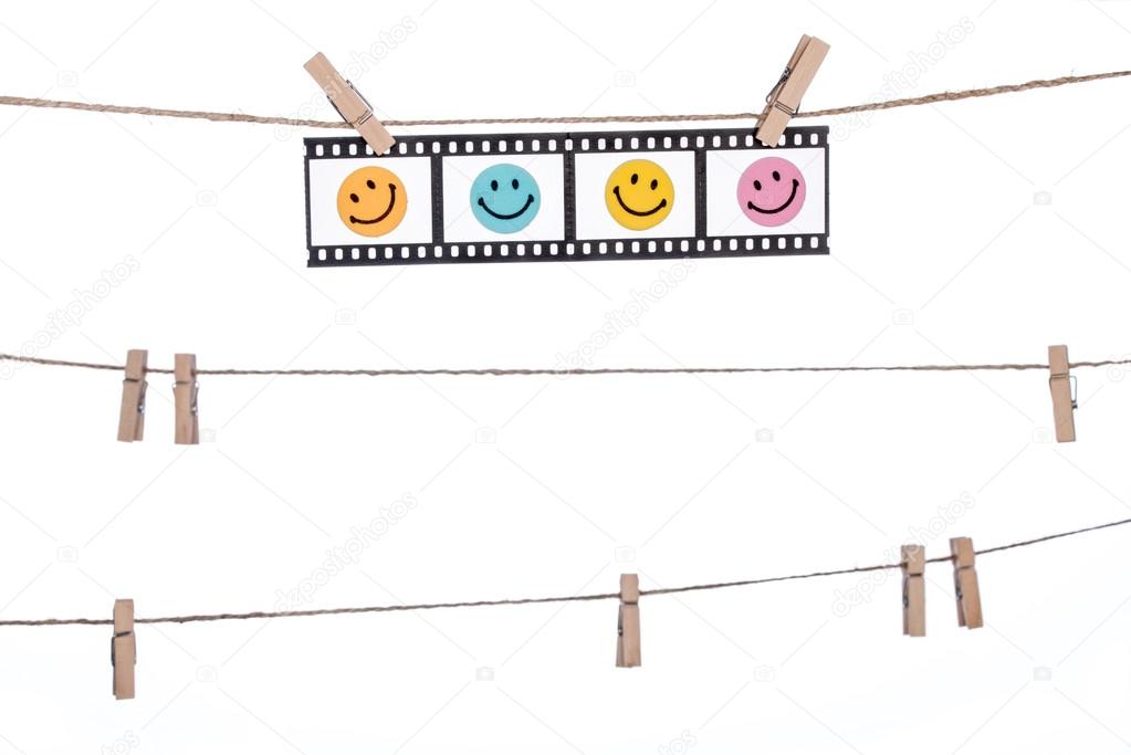 hanging Photographic Negatives with smiley face,  Comedy happy l