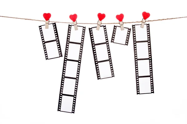 Clip a forma di cuore su uno spago, appeso Negativi, film d'amore — Foto Stock