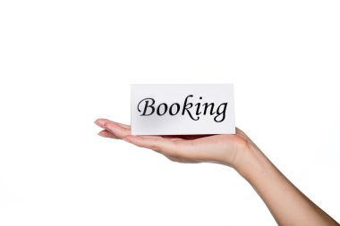 otel rezervasyon, rezervasyon kartı tutan kadın el 