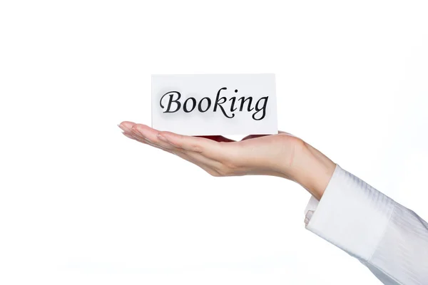 Hotel boeking, vrouw hand met boeking kaart — Stockfoto