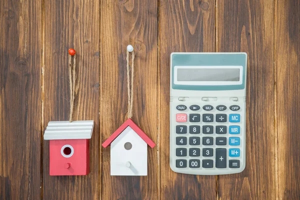 Rekenmachine voor hypotheken, huis met Calculator — Stockfoto