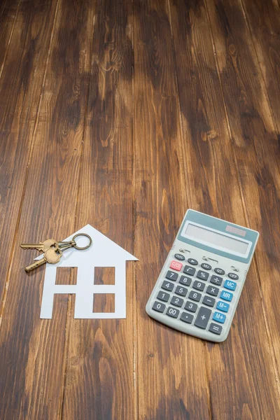 Calculadora de hipotecas, casa y llave con calculadora — Foto de Stock