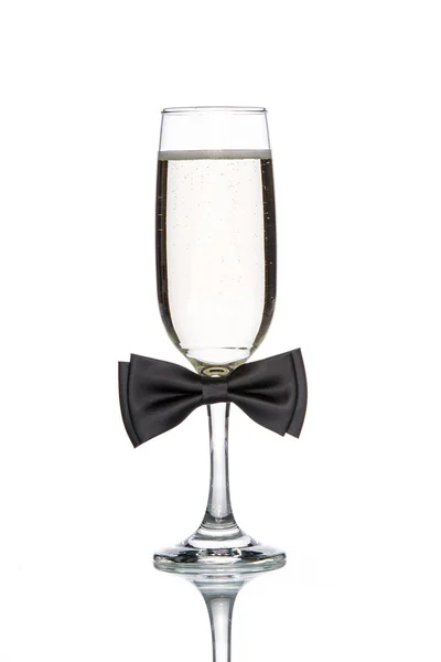 Copo de champanhe com laço preto — Fotografia de Stock