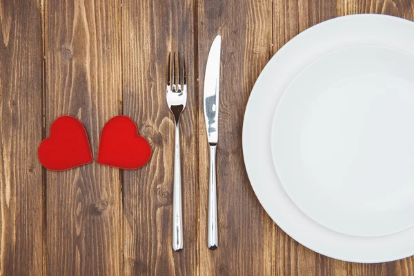 Celebra el día de San Valentín, la forma de los Corazones y un plato — Foto de Stock