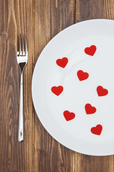 Celebra el día de San Valentín, los corazones se forman en un plato — Foto de Stock