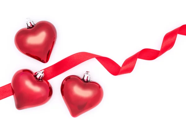 Celebrate Valentine's Day, hearts and red ribbon Stock Photo