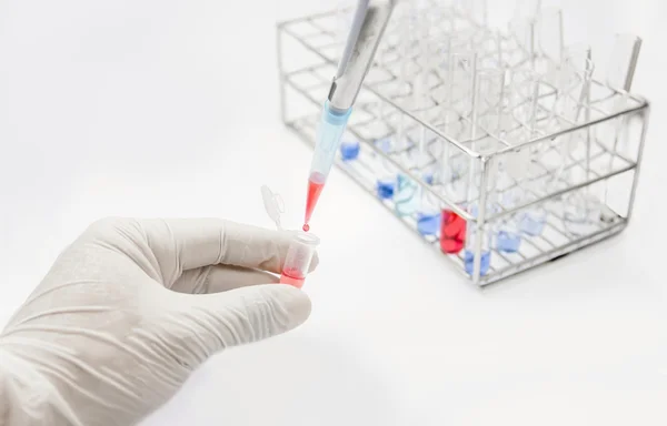 Drop red solution in tube test lab — Stock Photo, Image