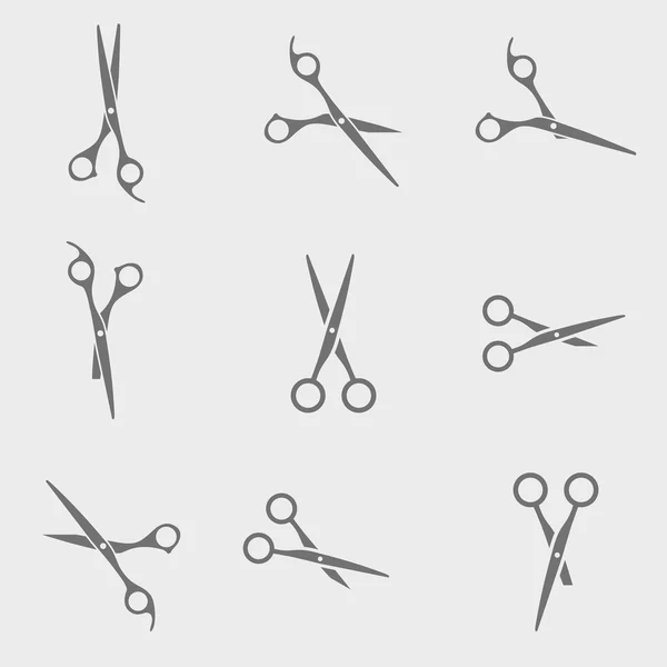 Set of black scissors on white background — Stock Vector