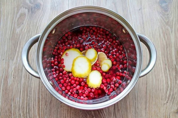 Pour Water Saucepan Add Lingonberries Cut Lemon Together Zest Removing — Stock Photo, Image