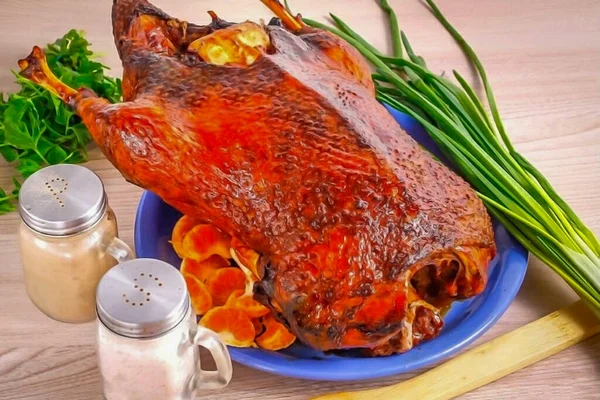Serve the duck in honey-mustard sauce hot. Juicy and aromatic duck baked with honey can be served with fruits or pickles, vegetable salad or mashed potatoes. Duck meat is especially tasty in a duet with various berry sauces, low-fat cheese, etc.