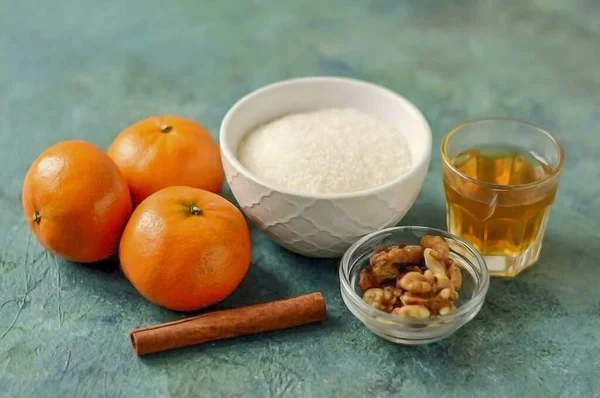 Prepare All Ingredients Orange Liqueur Walnuts Cinnamon Water Tangerines Sugar — Stock Photo, Image