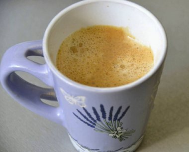 Pour the espresso into the yolk mixture.