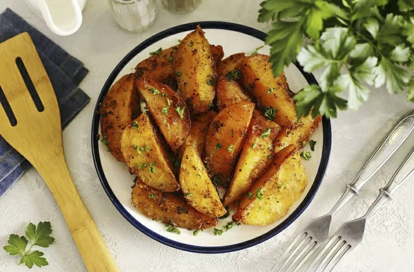 Polish potatoes are ready. A very tasty and simple recipe for baked golden potatoes. Can be served on its own with a variety of sauces, or as a side dish for lunch or dinner. You can cook potatoes in Polish for a family meal or for any festive table.