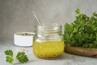 The salad dressing without mayonnaise is ready! This sauce is stored for 3-5 days in the refrigerator. The sauce tastes bright, aromatic, with a well-defined citrus note. Ideal for fresh green salads. clipart