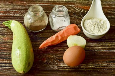 Prepare all the ingredients needed to make the Diabetic Zucchini Fritters.