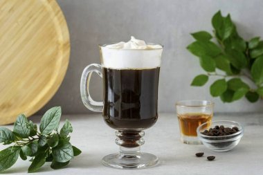 Place a layer of whipped cream on top of the glass. Due to rum, the drink warms well, therefore it will be especially relevant in the cold season. Bon Appetit! clipart