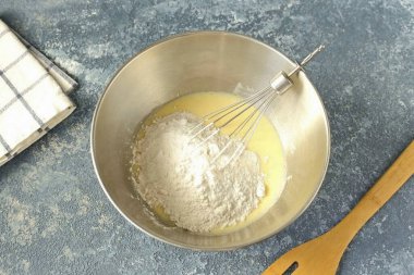 Stir, add flour and baking soda.