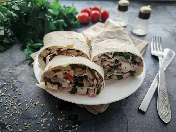 Lavash roll with mushrooms and crab sticks is ready. Lavash roll with mushrooms and crab sticks is a delicious and satisfying snack that will perfectly diversify your daily menu. Take note of the recipe! Bon Appetit!