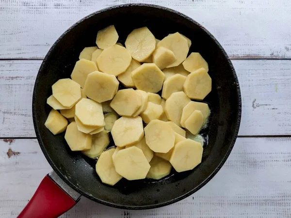 Put Potatoes Well Heated Frying Pan Vegetable Oil Roast Potatoes — Stock Photo, Image