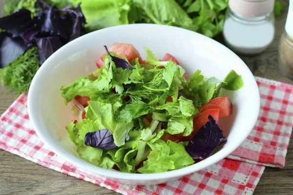 Add all the greens you need: lettuce, parsley, dill and basil leaves. The more greenery, the tastier.