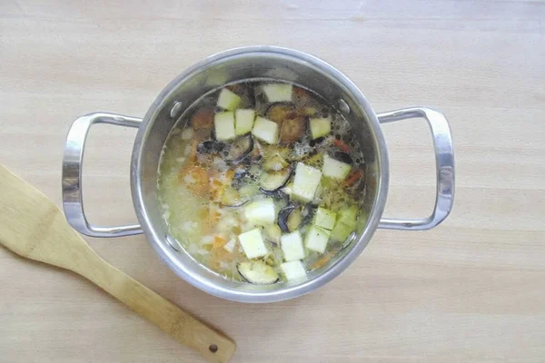 Potatoes Onions Carrots Almost Cooked Add Eggplant Sliced Zucchini Pot — Stock Photo, Image