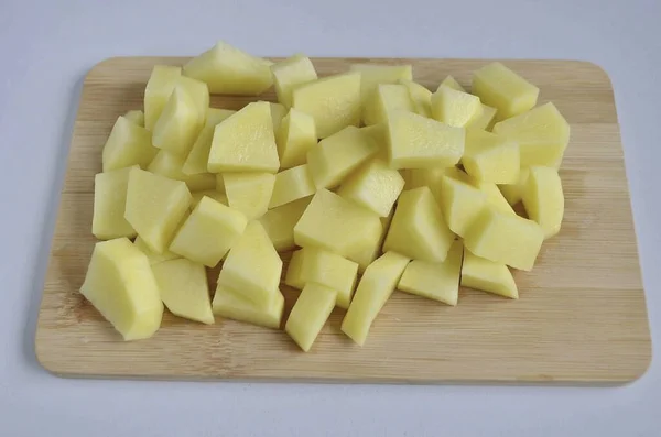 Peel Potatoes Cut Cubes Put Boiling Broth — Stock Photo, Image