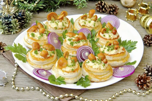 New Year\'s oxen with cheese and mushrooms are ready. An unusually tasty festive snack that will cheer up both you and your guests. Beautiful and easy to prepare, it will become a worthy decoration of the festive table. Bon Appetit!