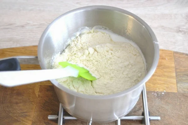 Pour All Flour Saucepan Once Stir Vigorously — Stock Photo, Image