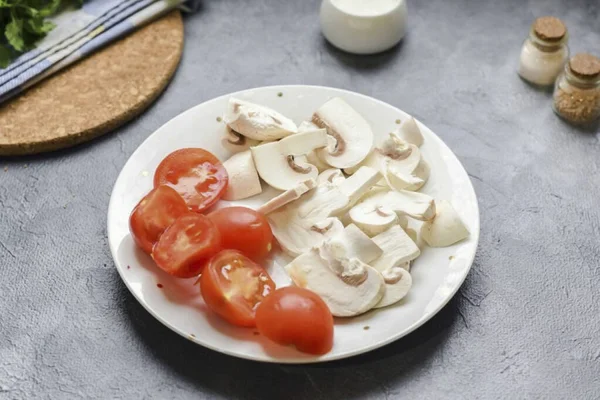 Cut Mushrooms Plates Cut Cherry Tomatoes Half — Stock Photo, Image