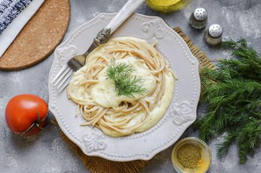 If you love spaghetti, then you will surely like a simple but delicious sauce that we will prepare in a matter of minutes. Delicate, creamy, cheesy, just amazing! Bon Appetit! clipart