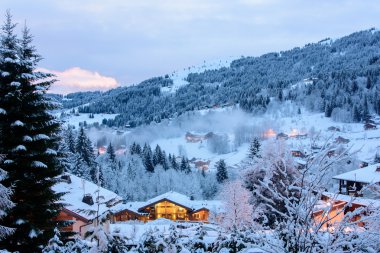 Winter evening in french alp valley clipart