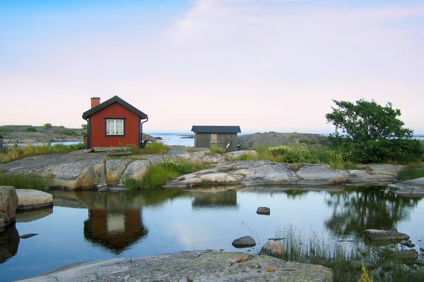 Small huts in the outer acrhipelago — Stock Photo, Image