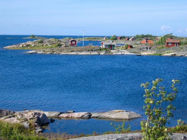 Mały czerwony archipelag chaty — Zdjęcie stockowe