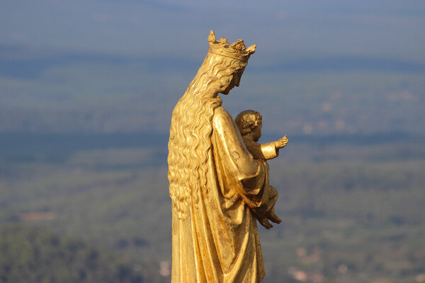 Golden statue of Virgin Mary and Baby Jesus