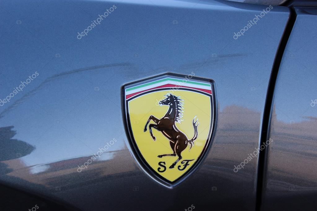Monte-Carlo - JAN 12 :  Logo of Ferrari on the blue sport car Ferrari parked in front of Casino, south of France on January 12, 2016 in Monte-Carlo, Monaco