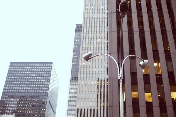 Skyscrapers rising up to sky on Manhattan — Stock Photo, Image