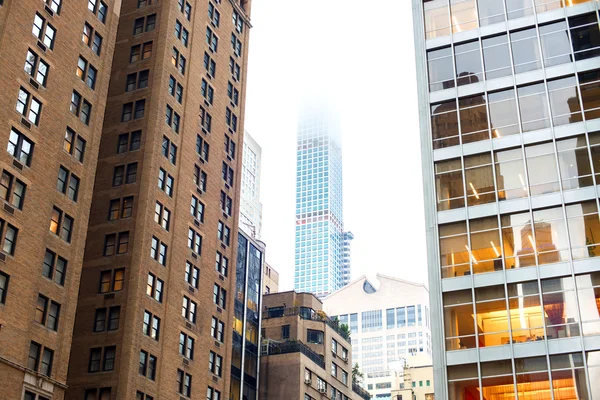 Skyscrapers rising up to sky on Manhattan — Stock Photo, Image