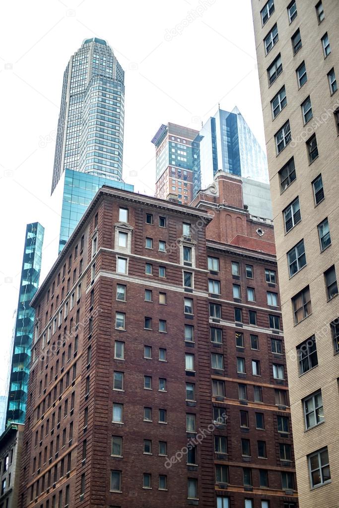 Skyscrapers rising up to sky on Manhattan