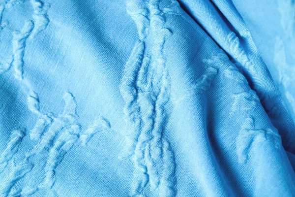 Blue textile on wooden background — Stock Photo, Image