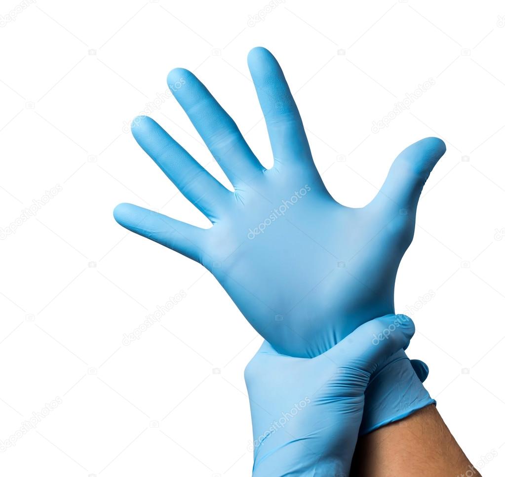 Doctor putting on protective gloves, isolated