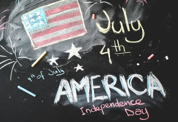 Black chalkboard in classroom with American flag...4 th of July — Stock Photo, Image