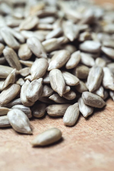 Sunflower Seeds on Wood Boards Closeup.Selective Focus — Stock Photo, Image