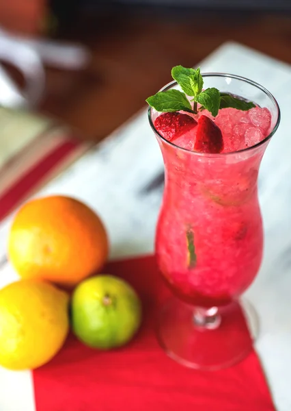 Strawberry cocktail decorated with mint in glass. Selective focus. — Stock Photo, Image