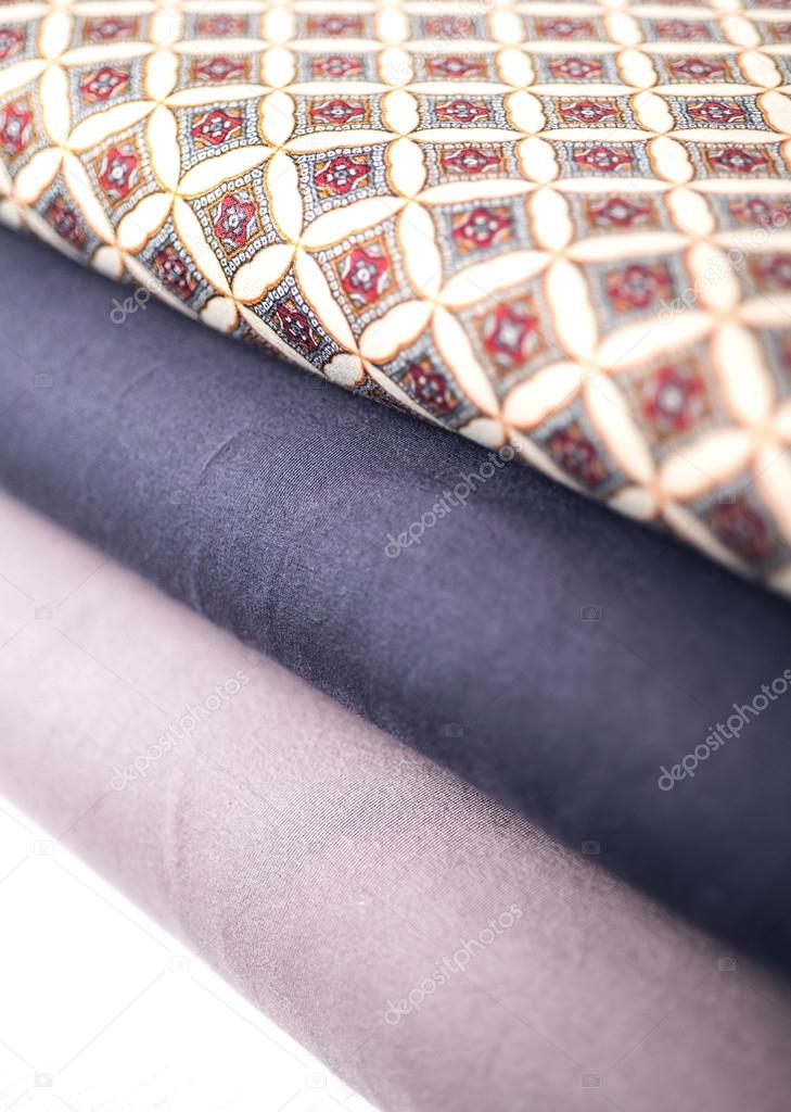 Rolls of colorful fabric as a vibrant background image