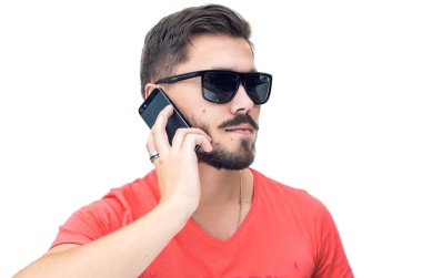 young man talking on mobile isolated.hite background