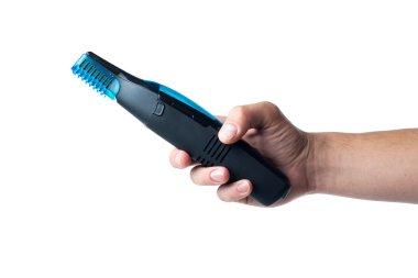 Beyaz arka plan ile izole el üstünde tutan Elektrikli tıraş makinesi