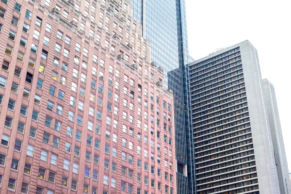 Skyscrapers rising up to sky on Manhattan