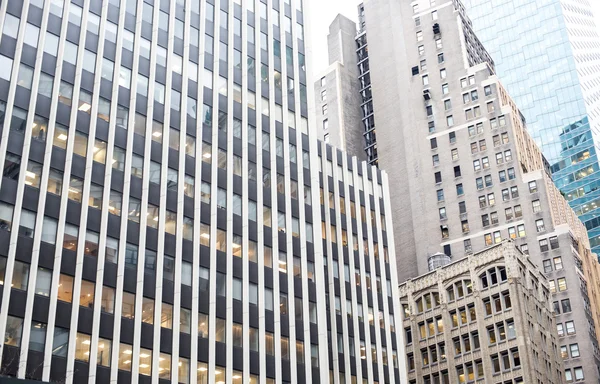 Skyscrapers rising up to sky on Manhattan — Stock Photo, Image