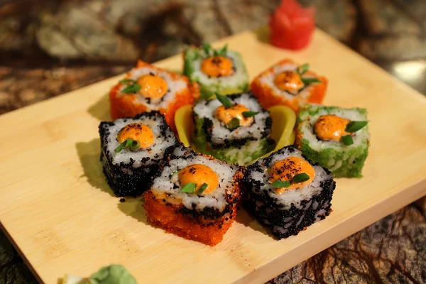 Delicious sauced Saka na maki sushi rolls — Stock Photo, Image